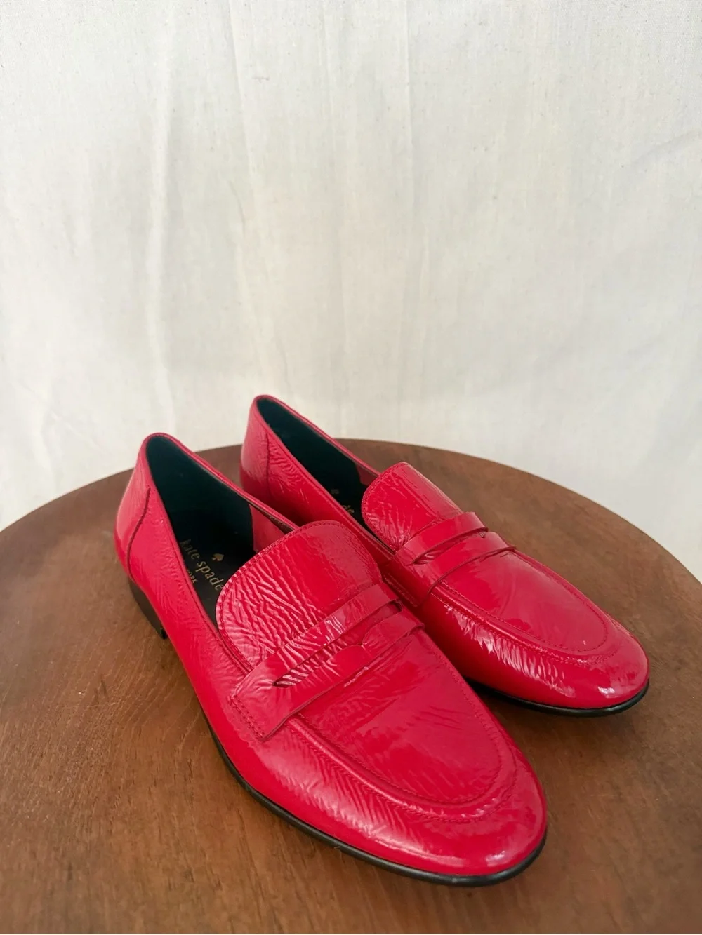 Kate Spade “Genevieve” crinkle parent loafers in Maraschino Red